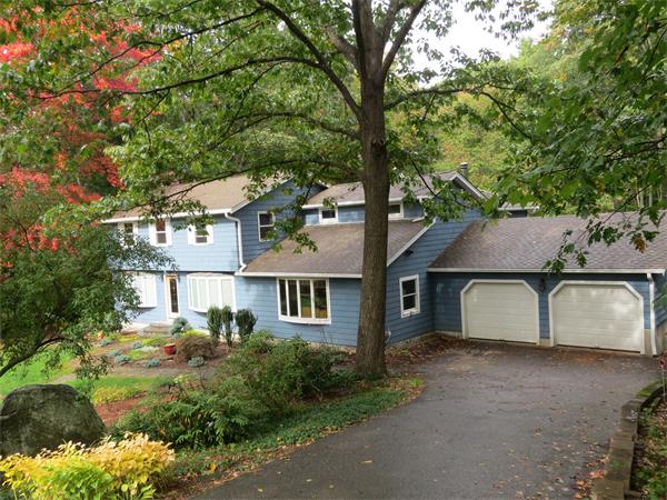 85 Box Mill Road Boxborough, MA 01719 - Photo 1 of 28 a house view with a garden space