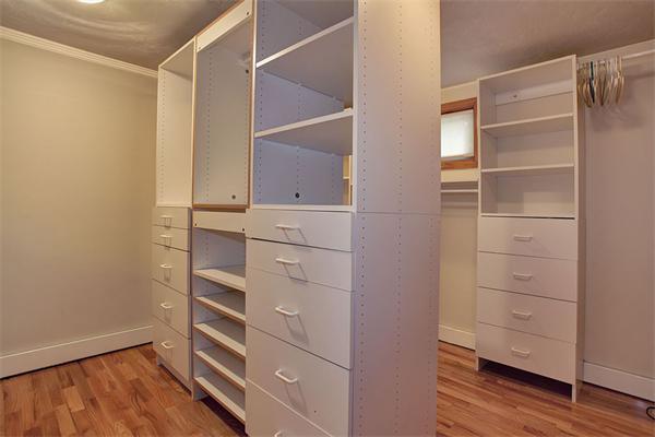85 Box Mill Road Boxborough, MA 01719 - Photo 23 of 28 a view of walk in closet with empty racks