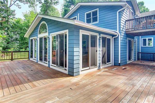 85 Box Mill Road Boxborough, MA 01719 - Photo 27 of 28 a view of a house with wooden deck