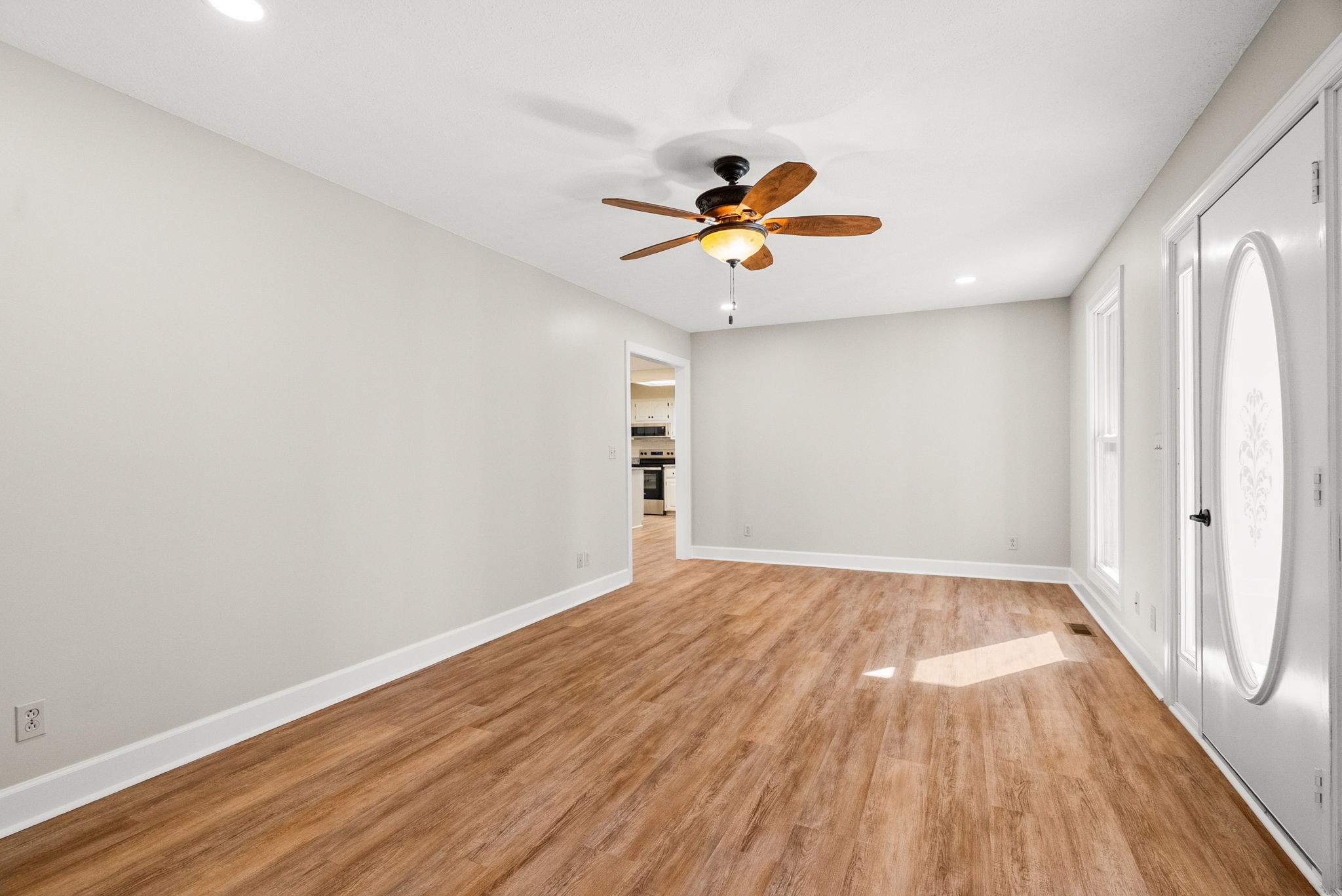 4540 Roy Cole Road Springfield, TN 37172 - Photo 18 of 61 a view of an empty room with window and wooden floor