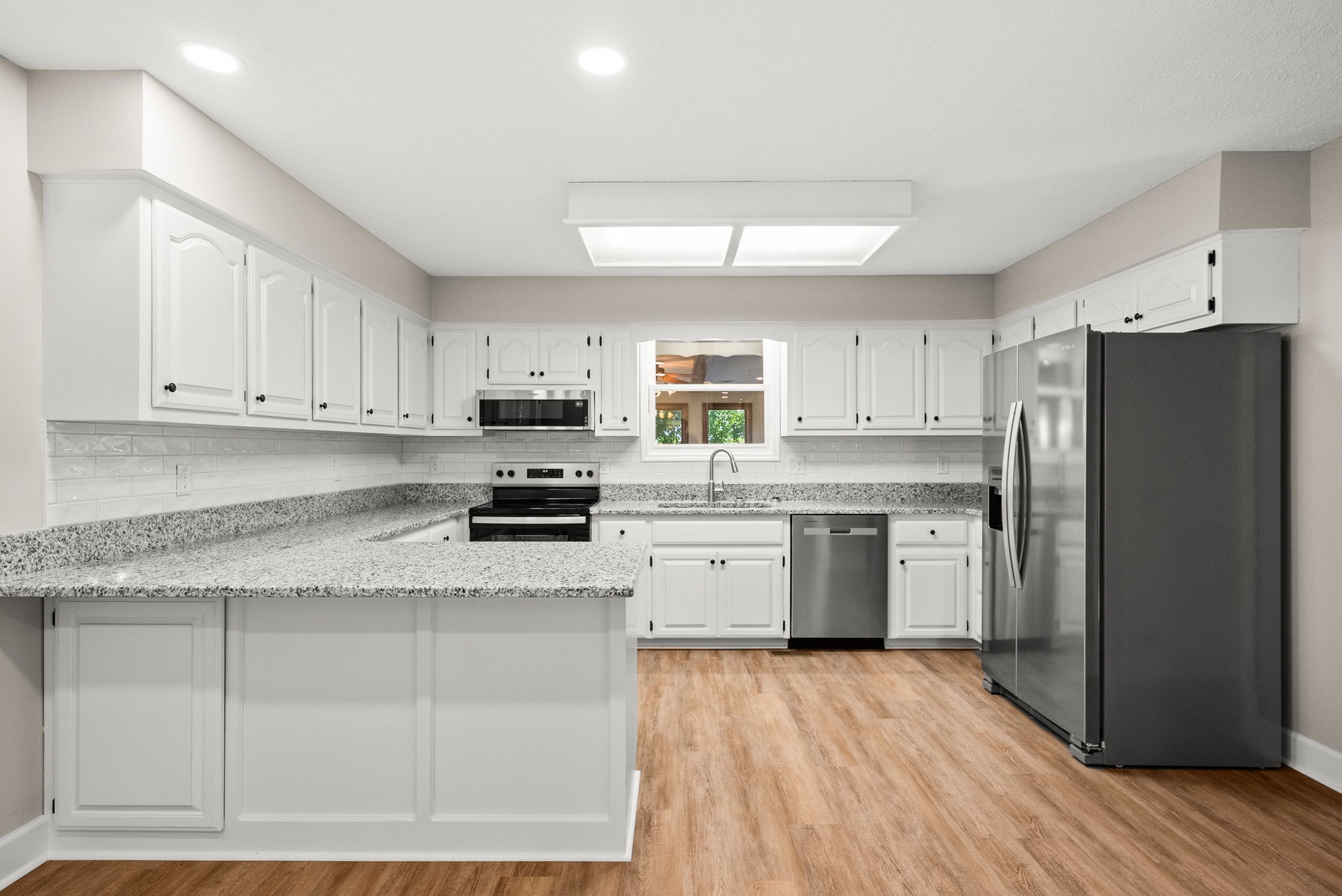 4540 Roy Cole Road Springfield, TN 37172 - Photo 22 of 61 a kitchen with a refrigerator a sink dishwasher with a stove and refrigerator