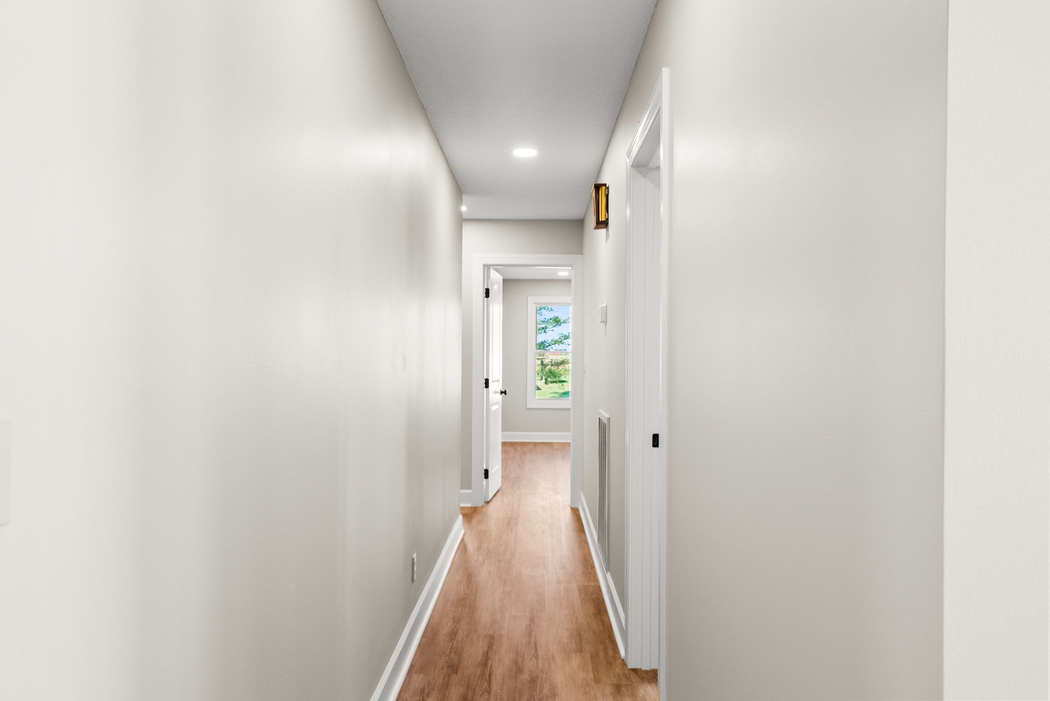 4540 Roy Cole Road Springfield, TN 37172 - Photo 25 of 61 a view of a hallway with wooden floor