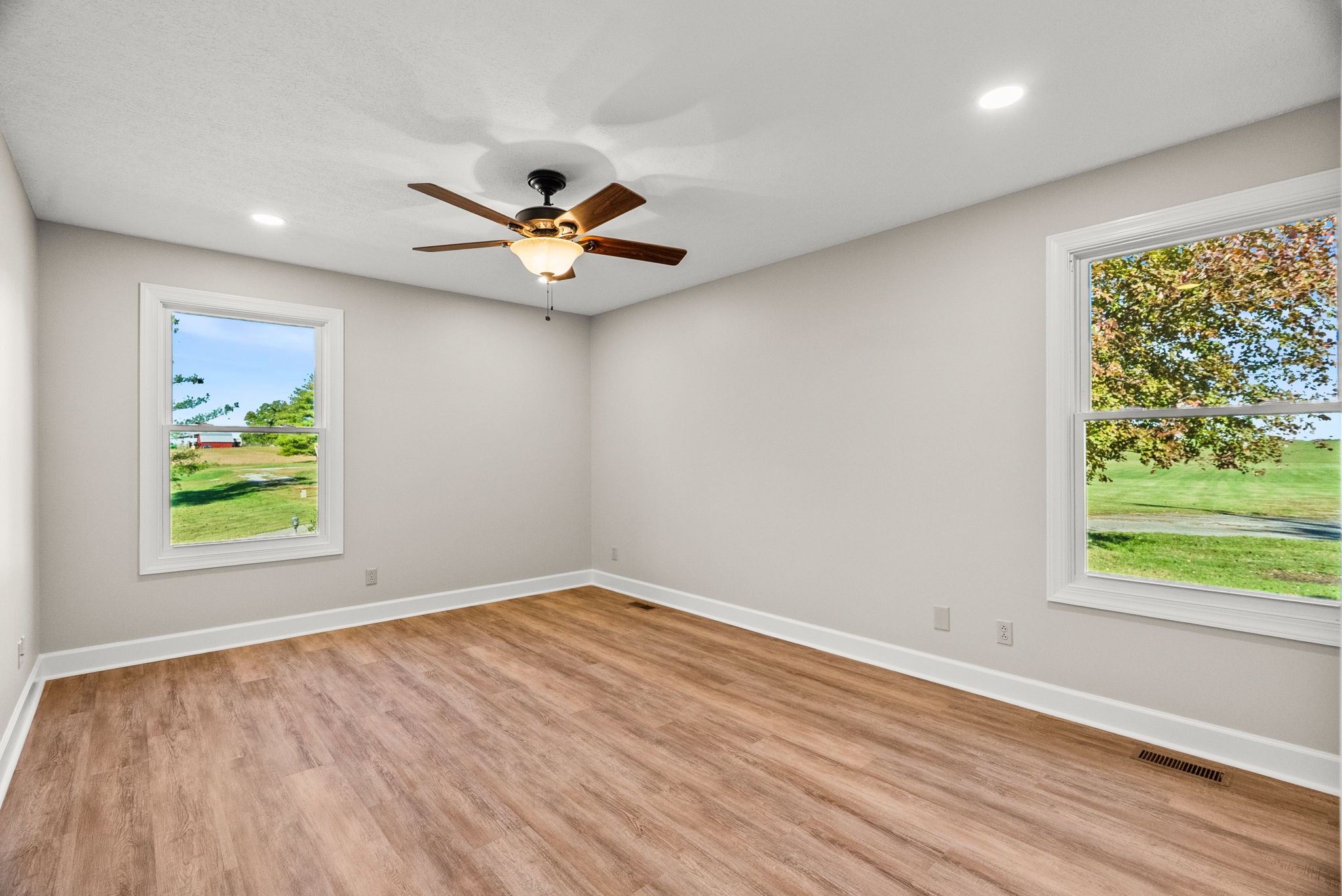 4540 Roy Cole Road Springfield, TN 37172 - Photo 29 of 61 an empty room with window and wooden floor
