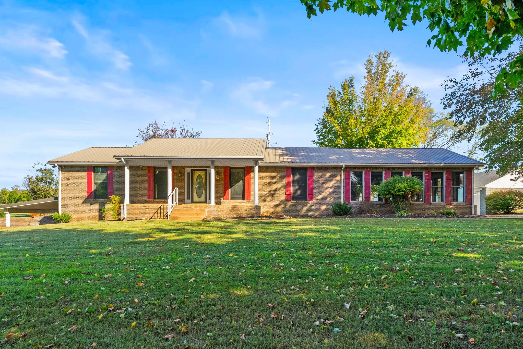 4540 Roy Cole Road Springfield, TN 37172 - Photo 3 of 61 front view of a brick house with a yard