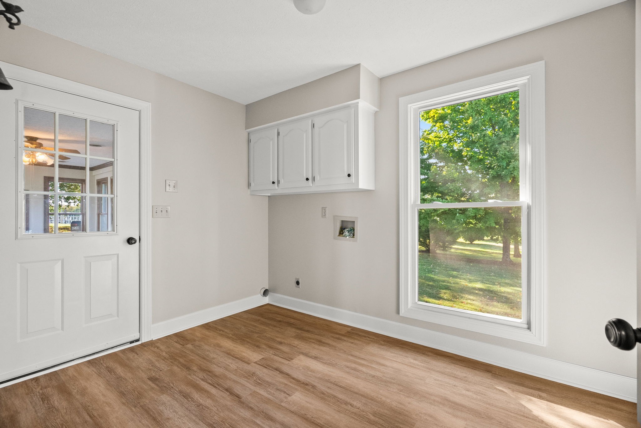4540 Roy Cole Road Springfield, TN 37172 - Photo 32 of 61 a view of empty room with wooden floor and fan
