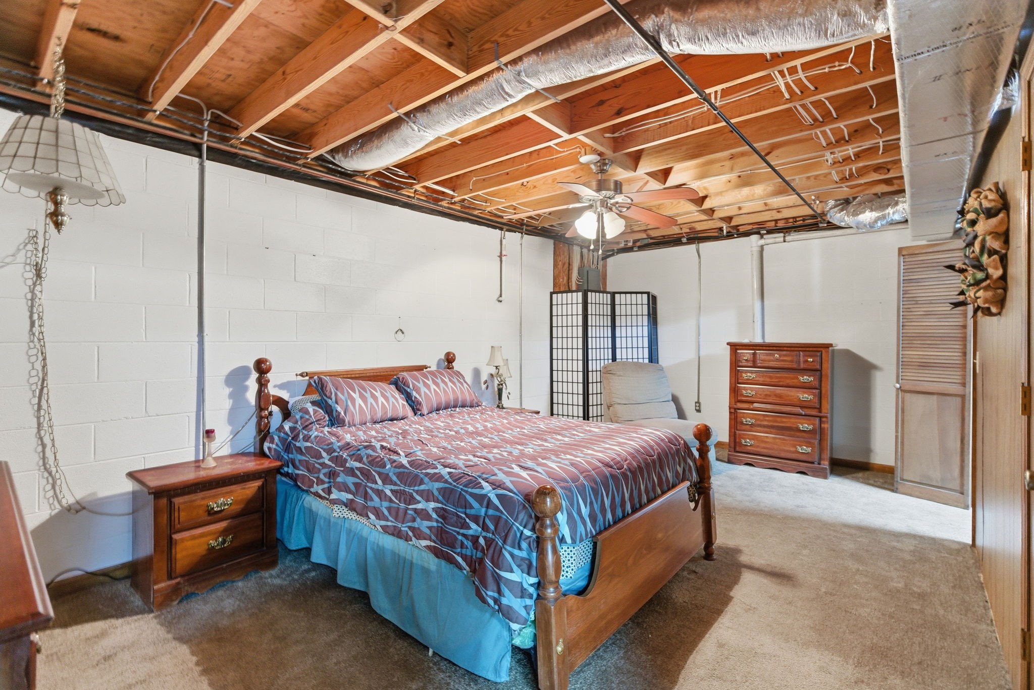 4540 Roy Cole Road Springfield, TN 37172 - Photo 38 of 61 a bed room with a bed and a chair