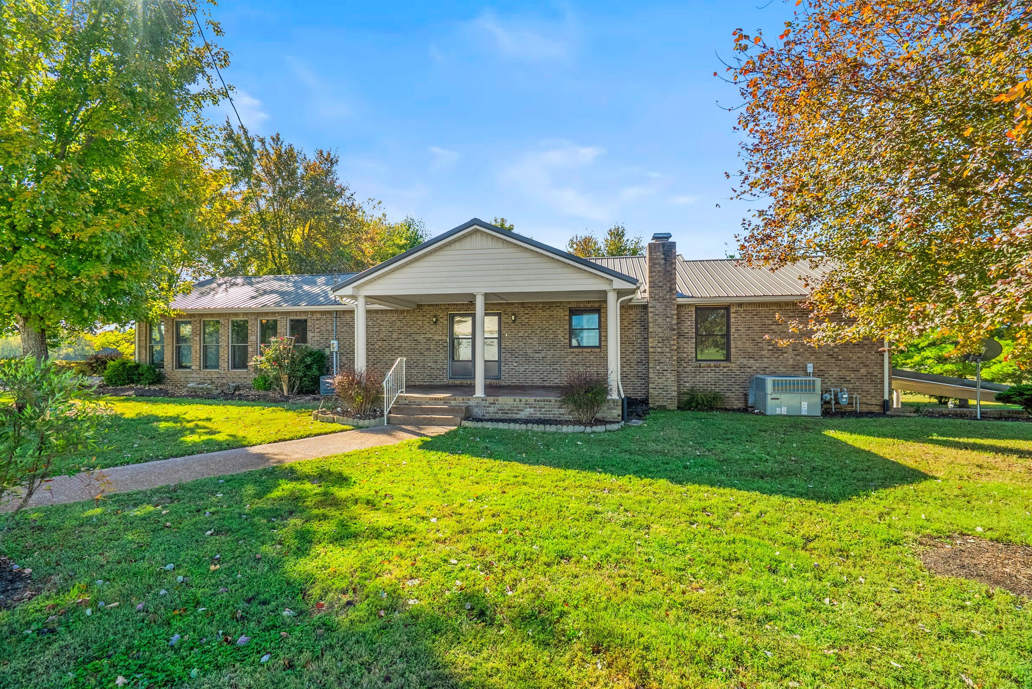 4540 Roy Cole Road Springfield, TN 37172 - Photo 46 of 61 a front view of a house with swimming pool having outdoor seating