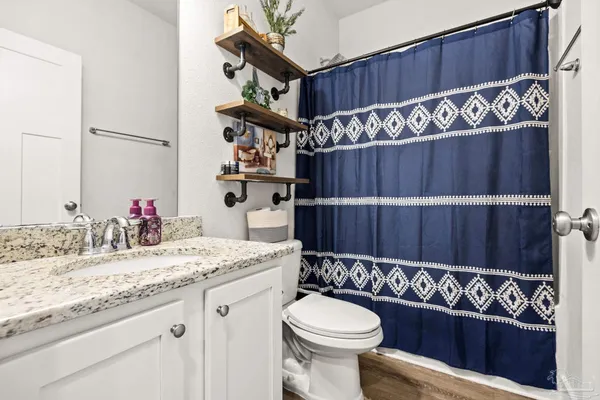 a backyard of a house with yard fire pit and outdoor seating