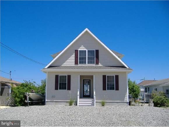 36 Compass Road Waretown, NJ 08758 - Photo 1 of 10 a front view of a house with garden