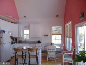 36 Compass Road Waretown, NJ 08758 - Photo 2 of 10 a view of a dining room with furniture and a window