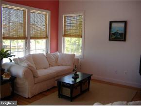 36 Compass Road Waretown, NJ 08758 - Photo 3 of 10 a living room with furniture and a window