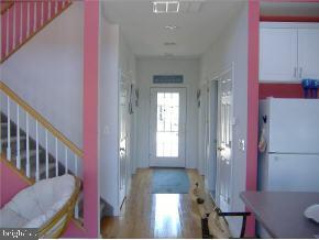 36 Compass Road Waretown, NJ 08758 - Photo 4 of 10 a view of entryway and hall with wooden floor
