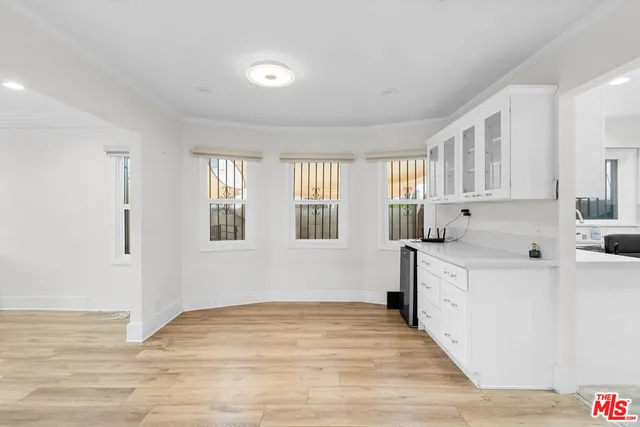 a view of a kitchen with electric appliances