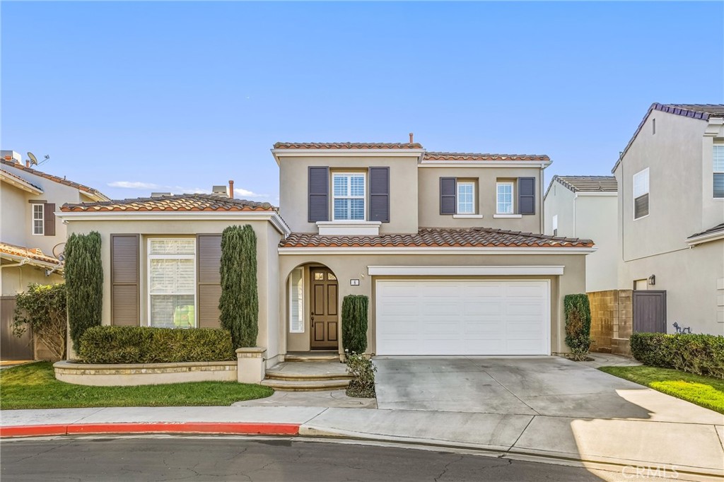 6 Sutton Irvine, CA 92618 - Photo 2 of 32 Full driveway, plus 3-car garage (two of the spaces are tandem)