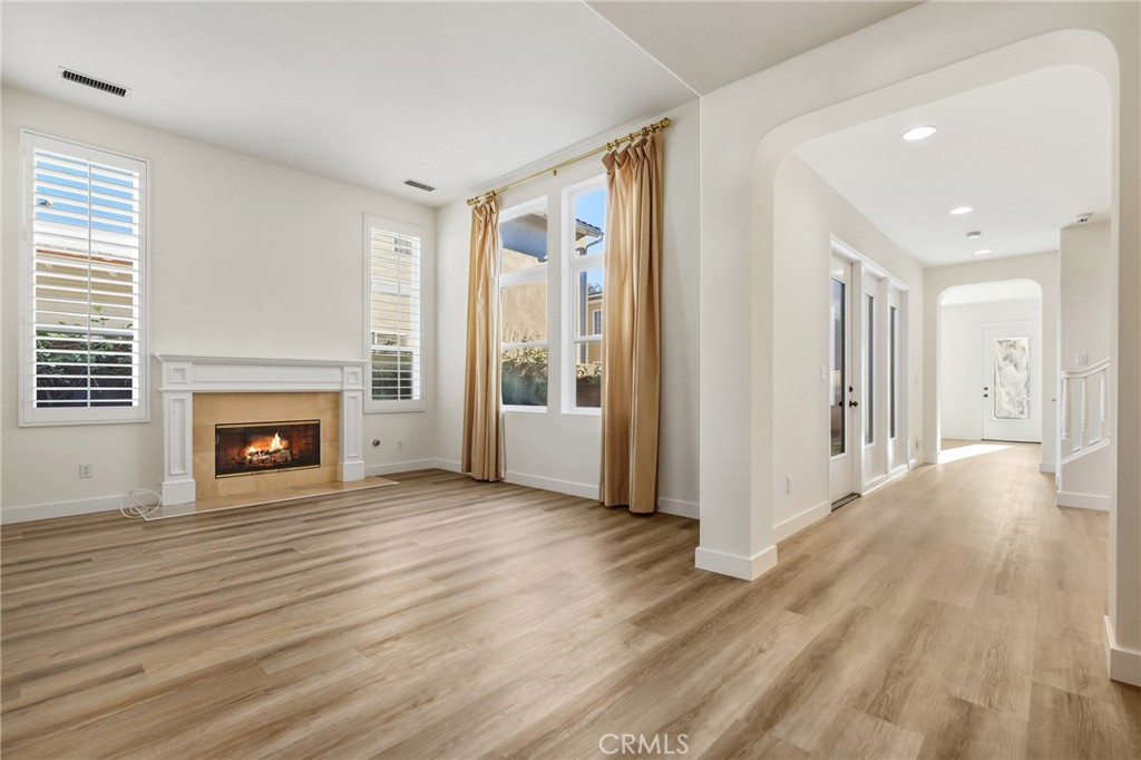 6 Sutton Irvine, CA 92618 - Photo 3 of 32 (Fire in the fireplace has been edited)