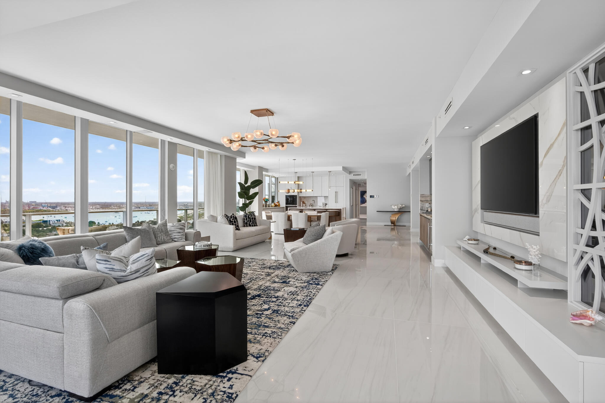 3100 North Ocean Drive, Unit HPH3 Riviera Beach, FL 33404 - Photo 13 of 42 a living room with furniture and a flat screen tv