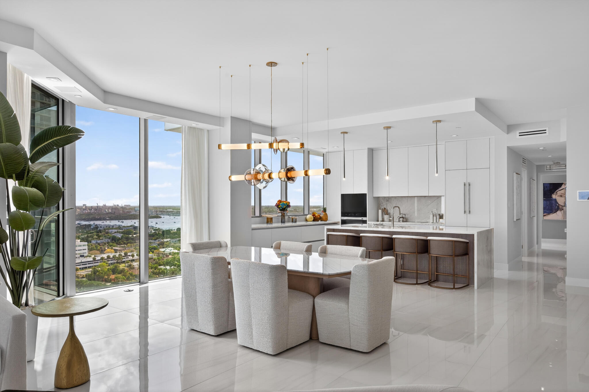 3100 North Ocean Drive, Unit HPH3 Riviera Beach, FL 33404 - Photo 14 of 42 a large white kitchen with lots of counter space and stainless steel appliances