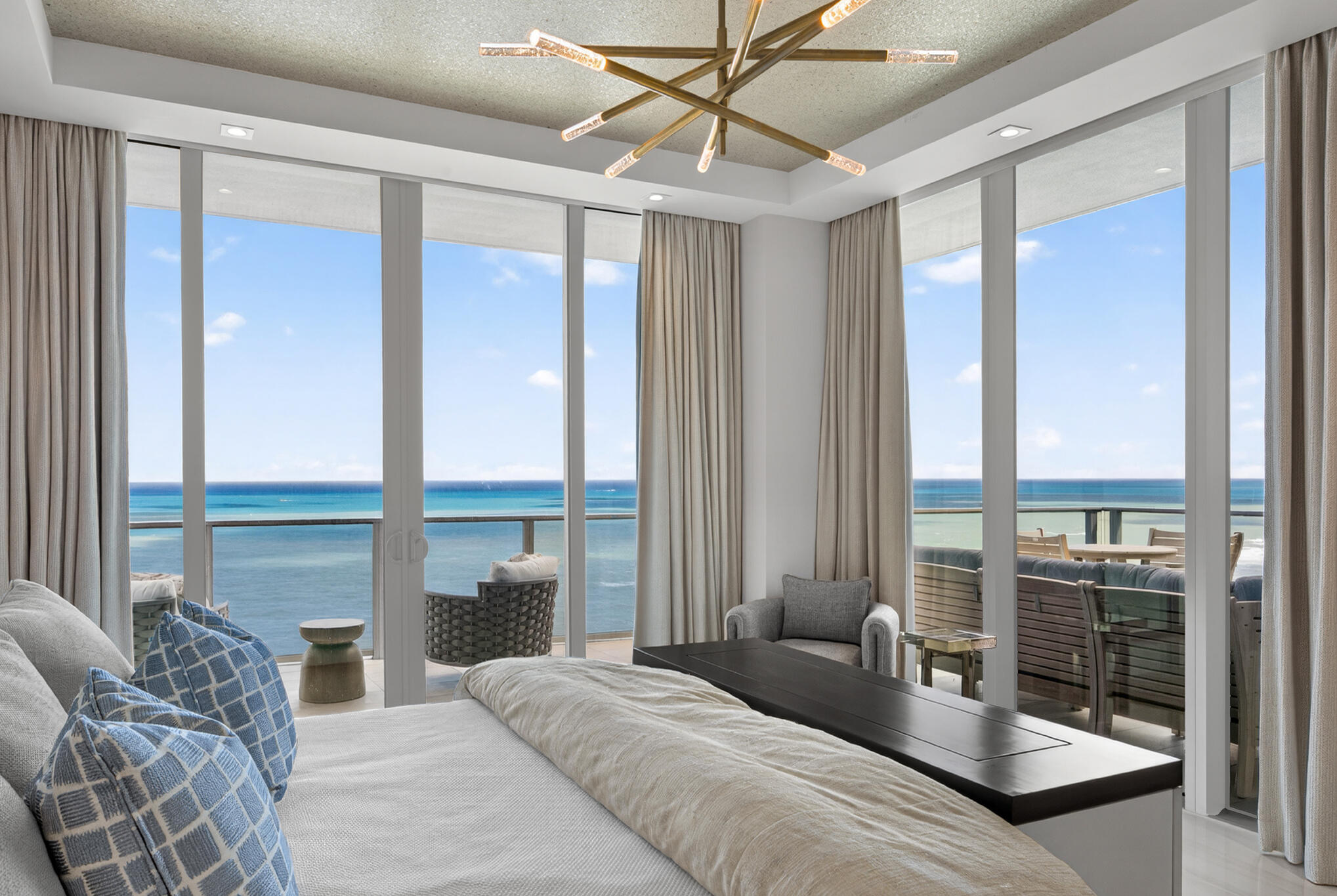 3100 North Ocean Drive, Unit HPH3 Riviera Beach, FL 33404 - Photo 20 of 42 a bedroom with a large bed and windows