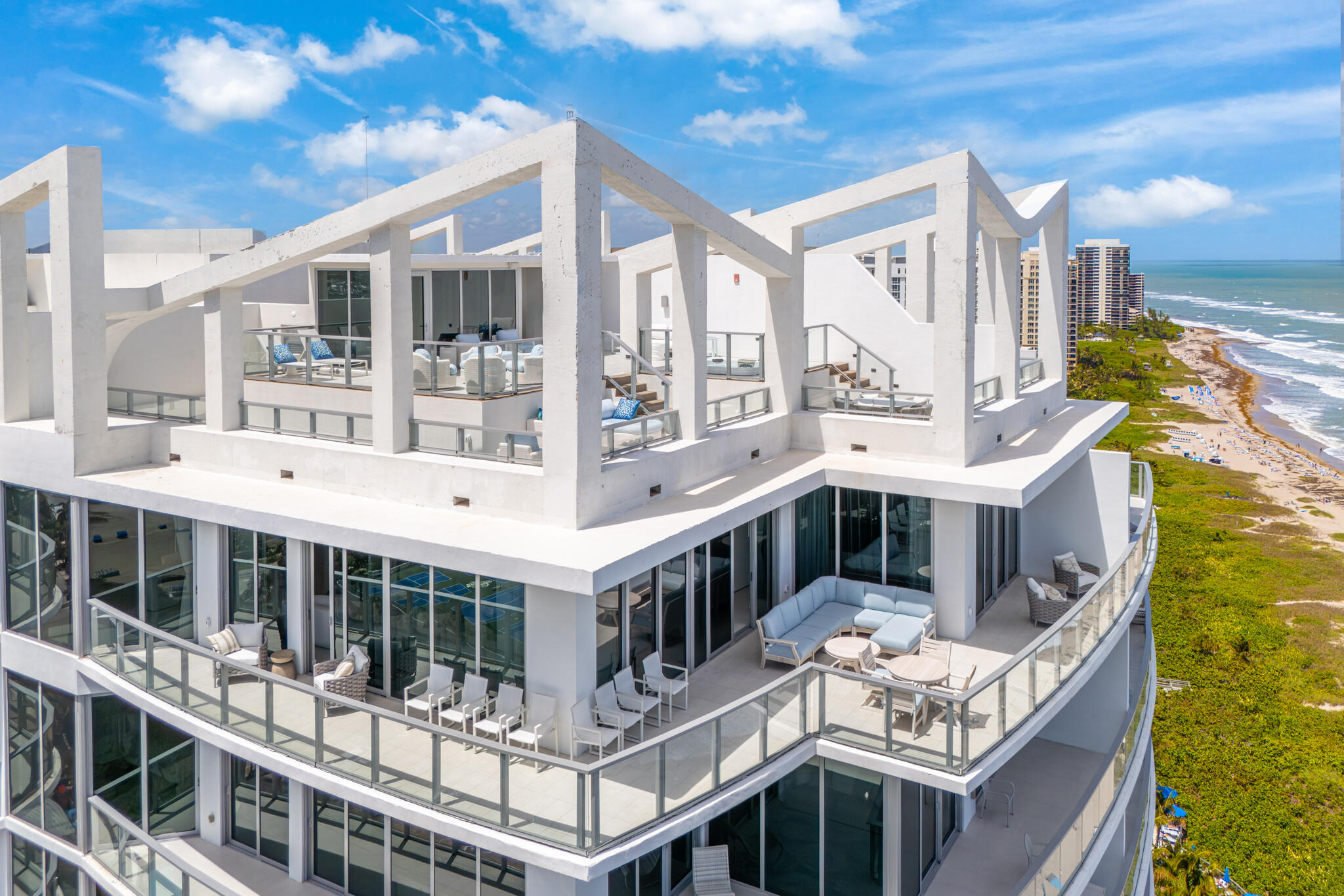 3100 North Ocean Drive, Unit HPH3 Riviera Beach, FL 33404 - Photo 2 of 42 a view of a building from a balcony