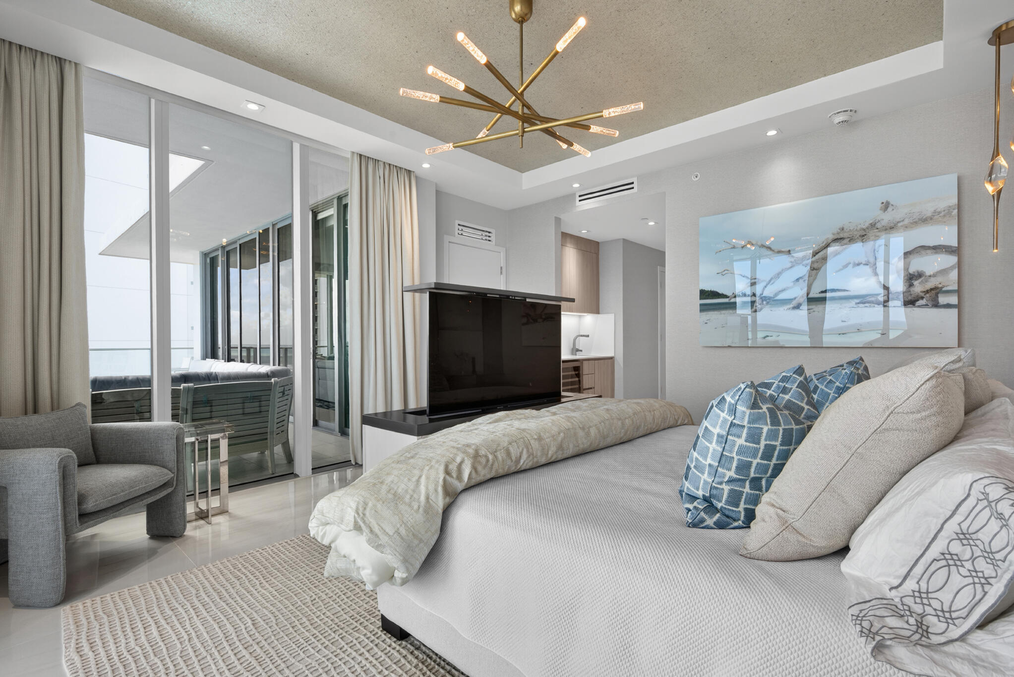 3100 North Ocean Drive, Unit HPH3 Riviera Beach, FL 33404 - Photo 21 of 42 a bedroom with a bed couch and a large window
