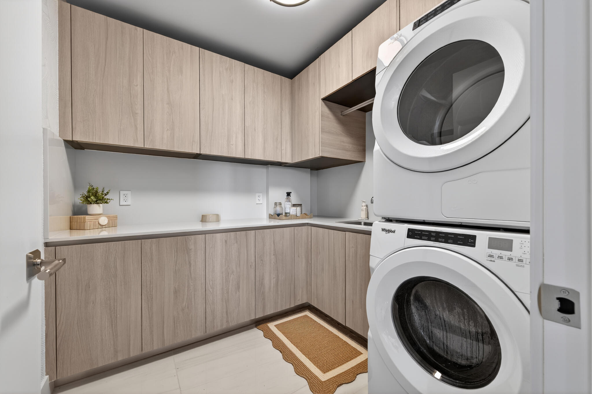 3100 North Ocean Drive, Unit HPH3 Riviera Beach, FL 33404 - Photo 33 of 42 a utility room with dryer and washer