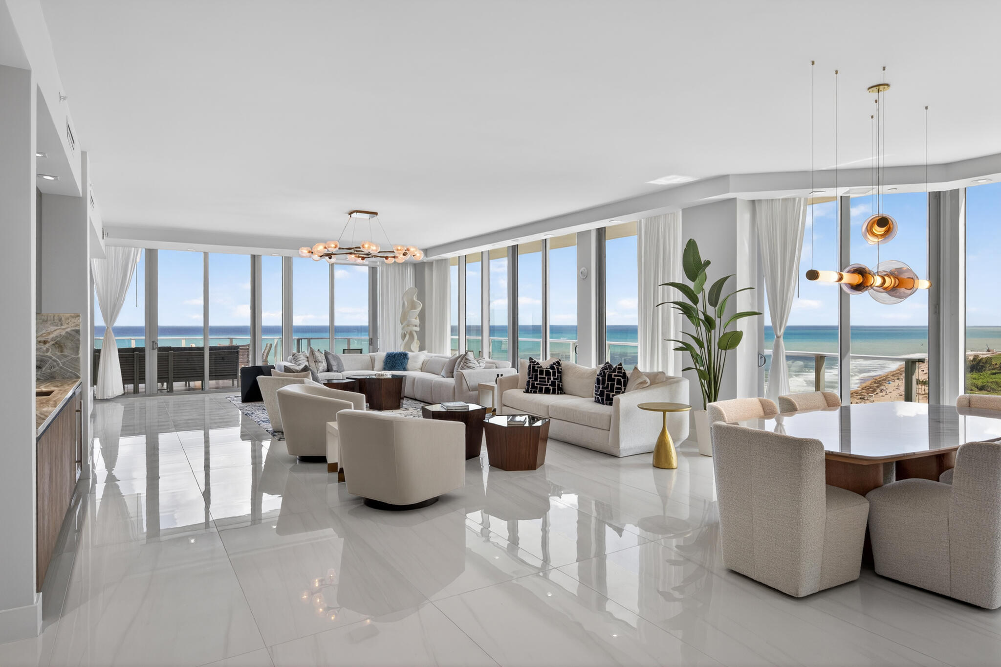 3100 North Ocean Drive, Unit HPH3 Riviera Beach, FL 33404 - Photo 4 of 42 a living room with furniture and a large window