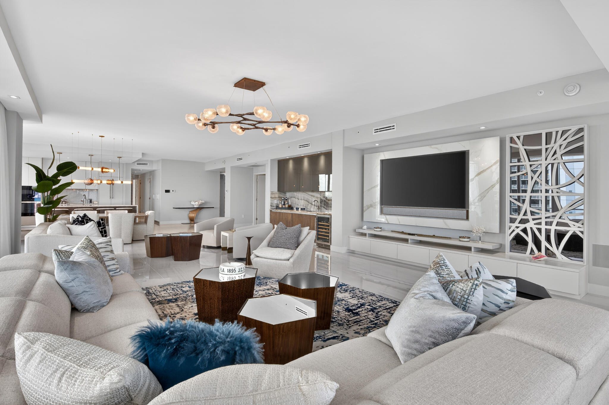 3100 North Ocean Drive, Unit HPH3 Riviera Beach, FL 33404 - Photo 9 of 42 a living room with furniture and a flat screen tv
