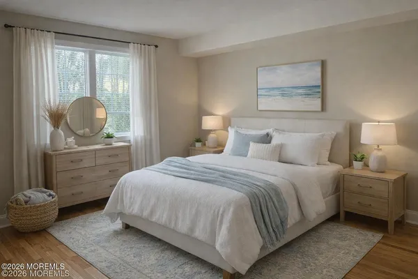 a bedroom with a bed and window