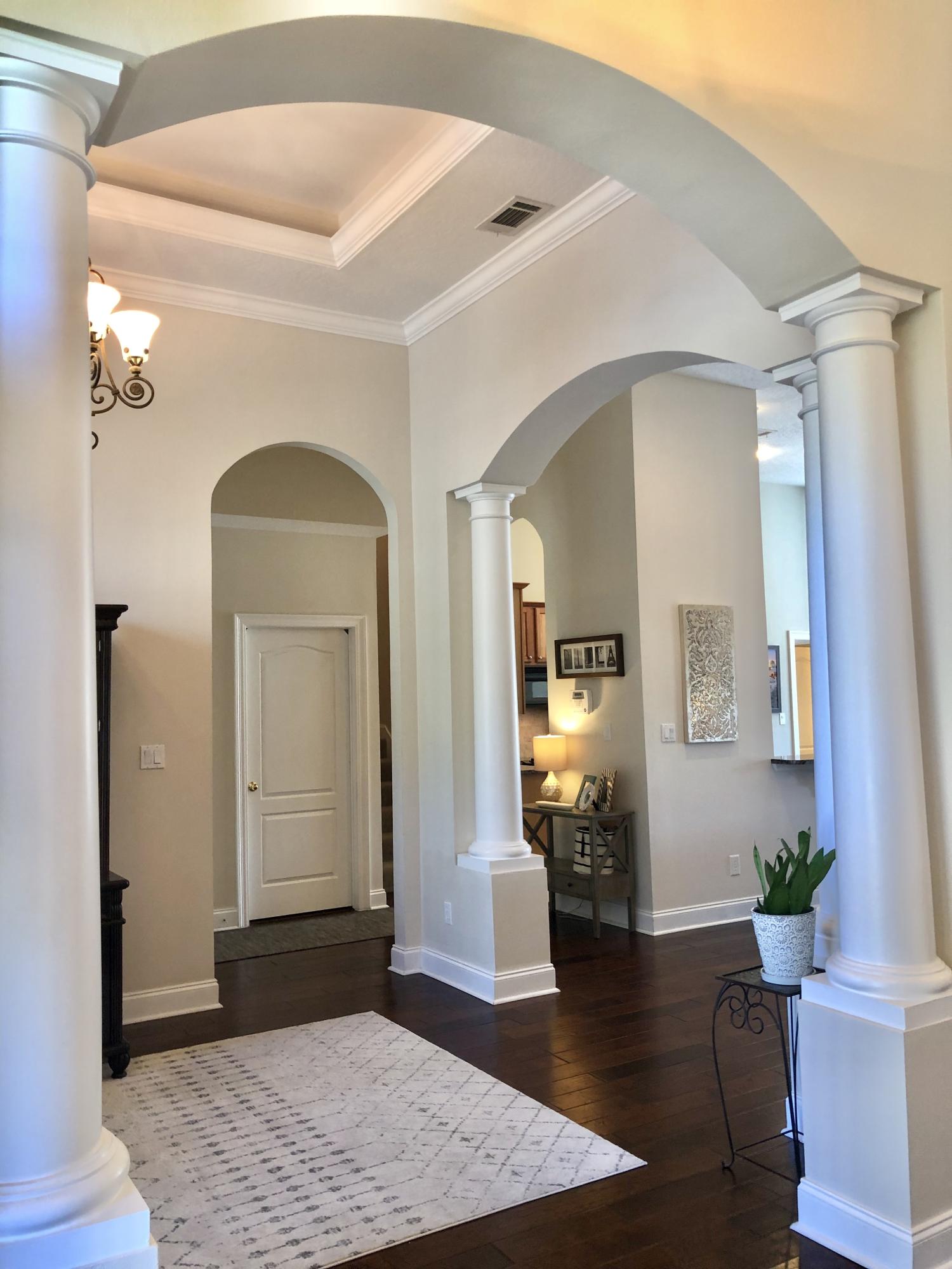 4611 Chanan Drive Crestview, FL 32539 - Photo 11 of 39 a view of a hallway view with wooden floor and a livingroom