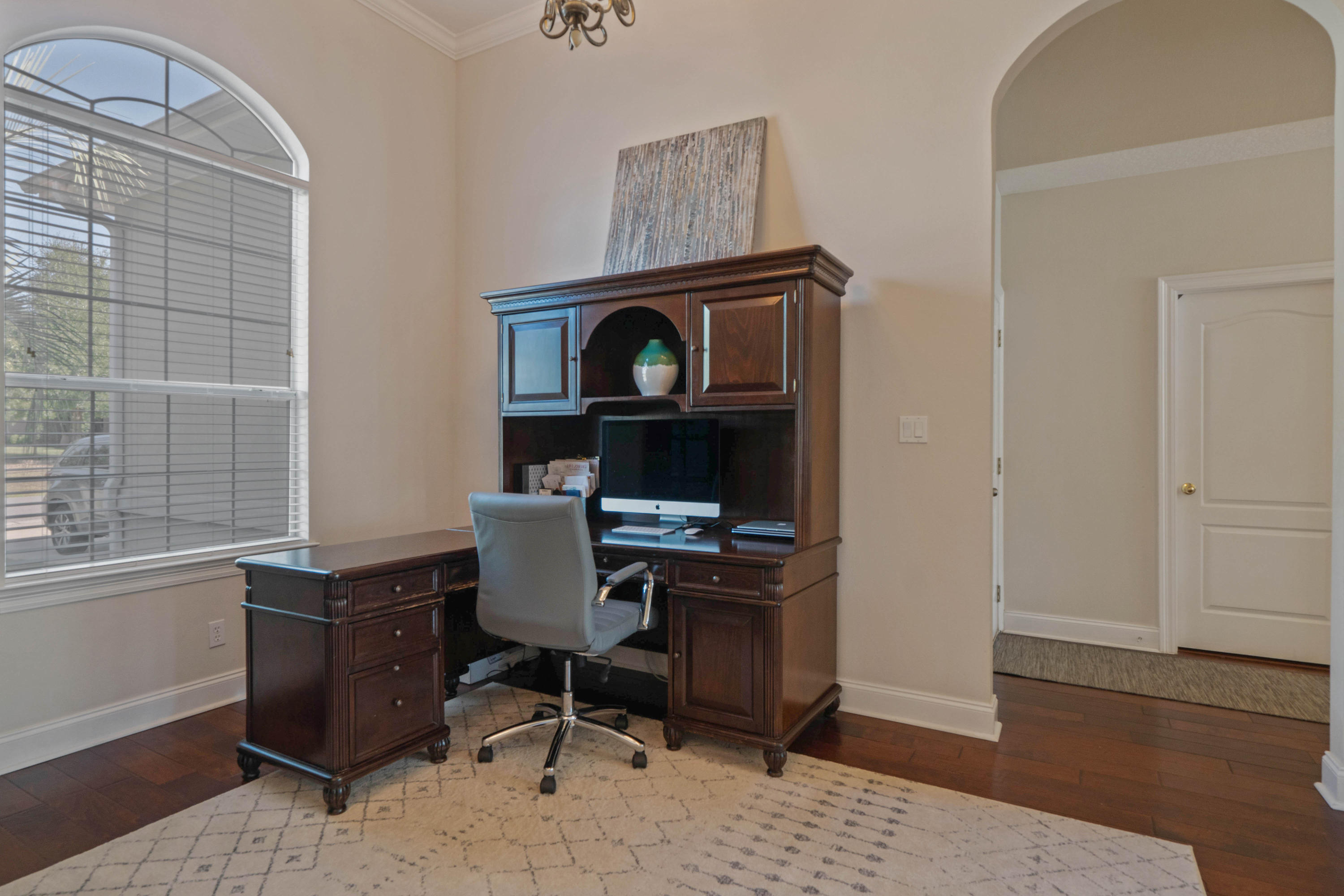 4611 Chanan Drive Crestview, FL 32539 - Photo 12 of 39 a view of a workspace with furniture and wooden floor
