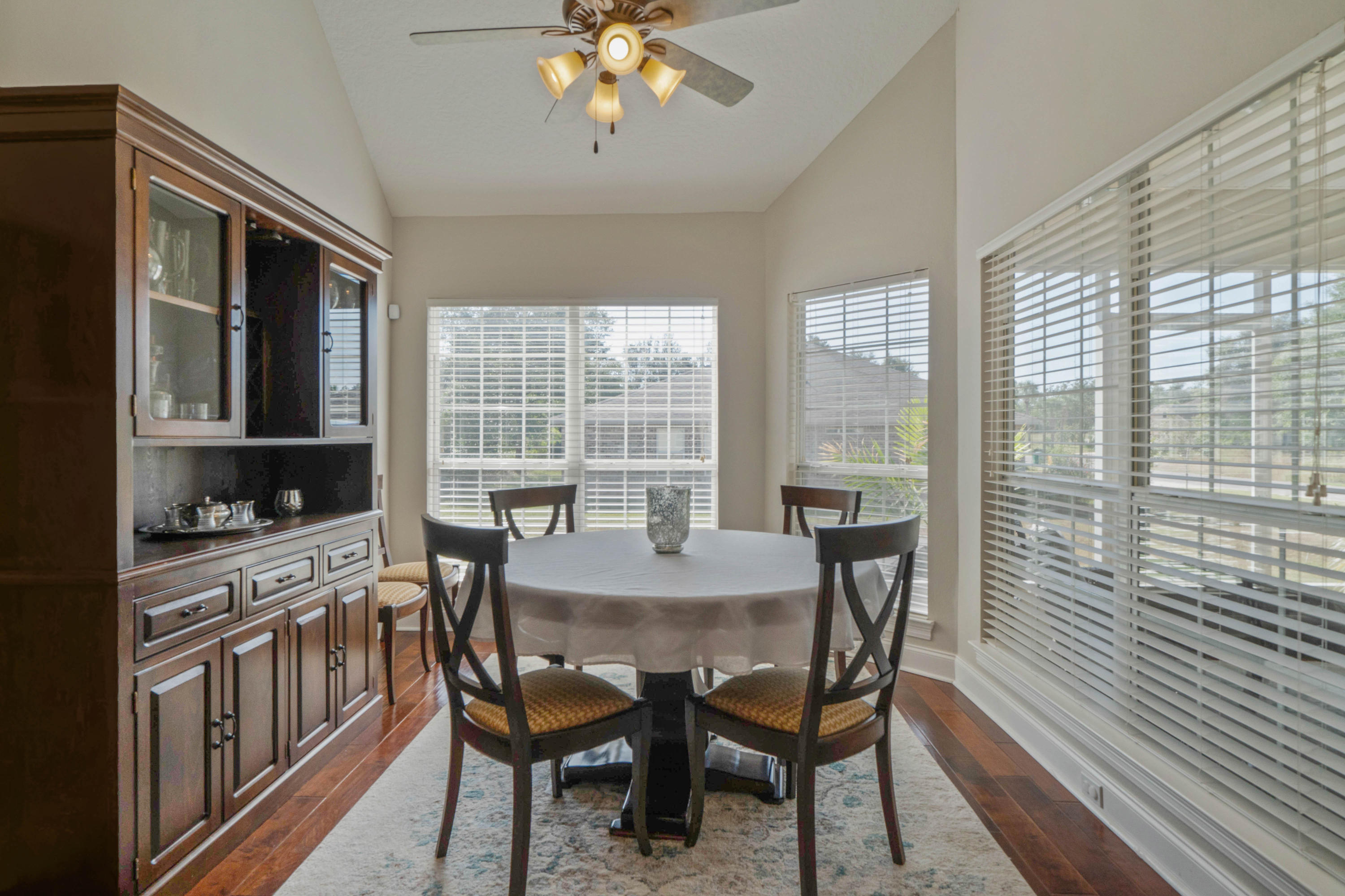 4611 Chanan Drive Crestview, FL 32539 - Photo 20 of 39 a view of a dining room with furniture window and outside view