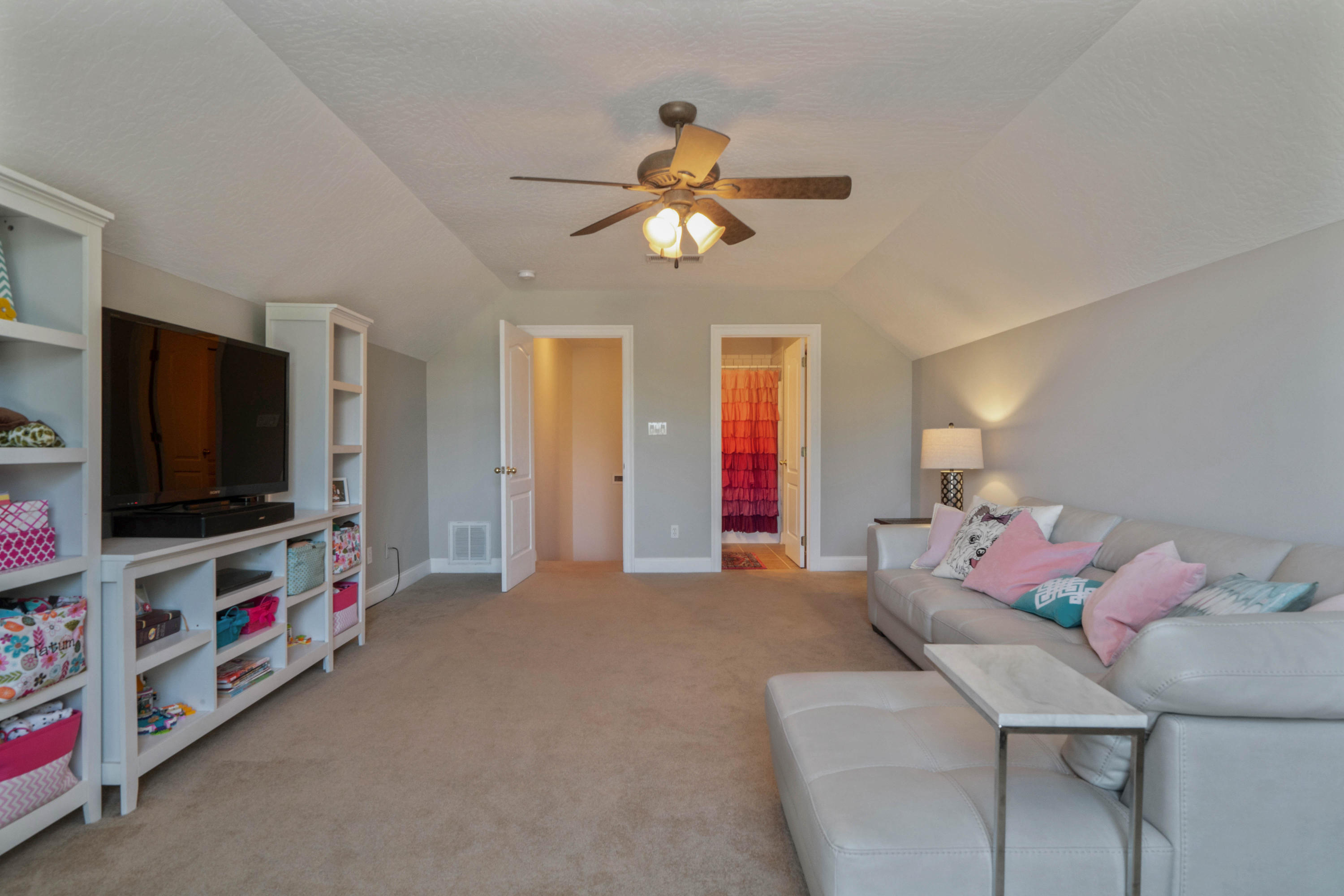 4611 Chanan Drive Crestview, FL 32539 - Photo 35 of 39 a living room with furniture and a flat screen tv