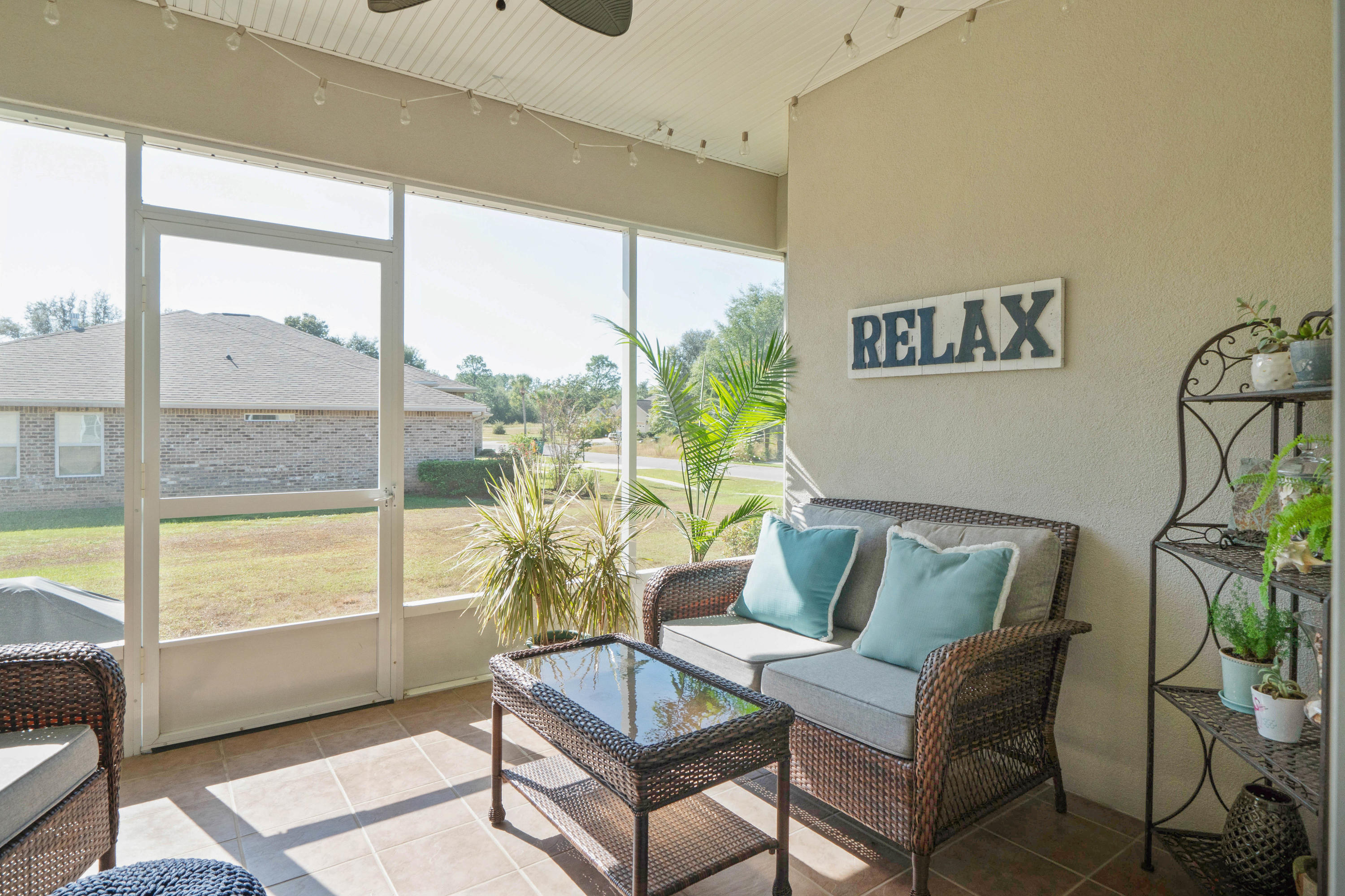 4611 Chanan Drive Crestview, FL 32539 - Photo 38 of 39 a living room with furniture and a large window