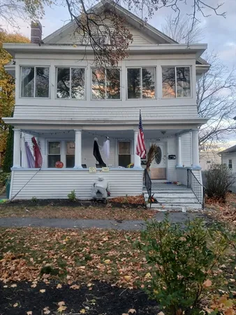 a view of house with yard