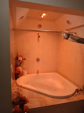 a bathroom with a sink and shower