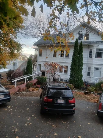 a car parked in front of a house