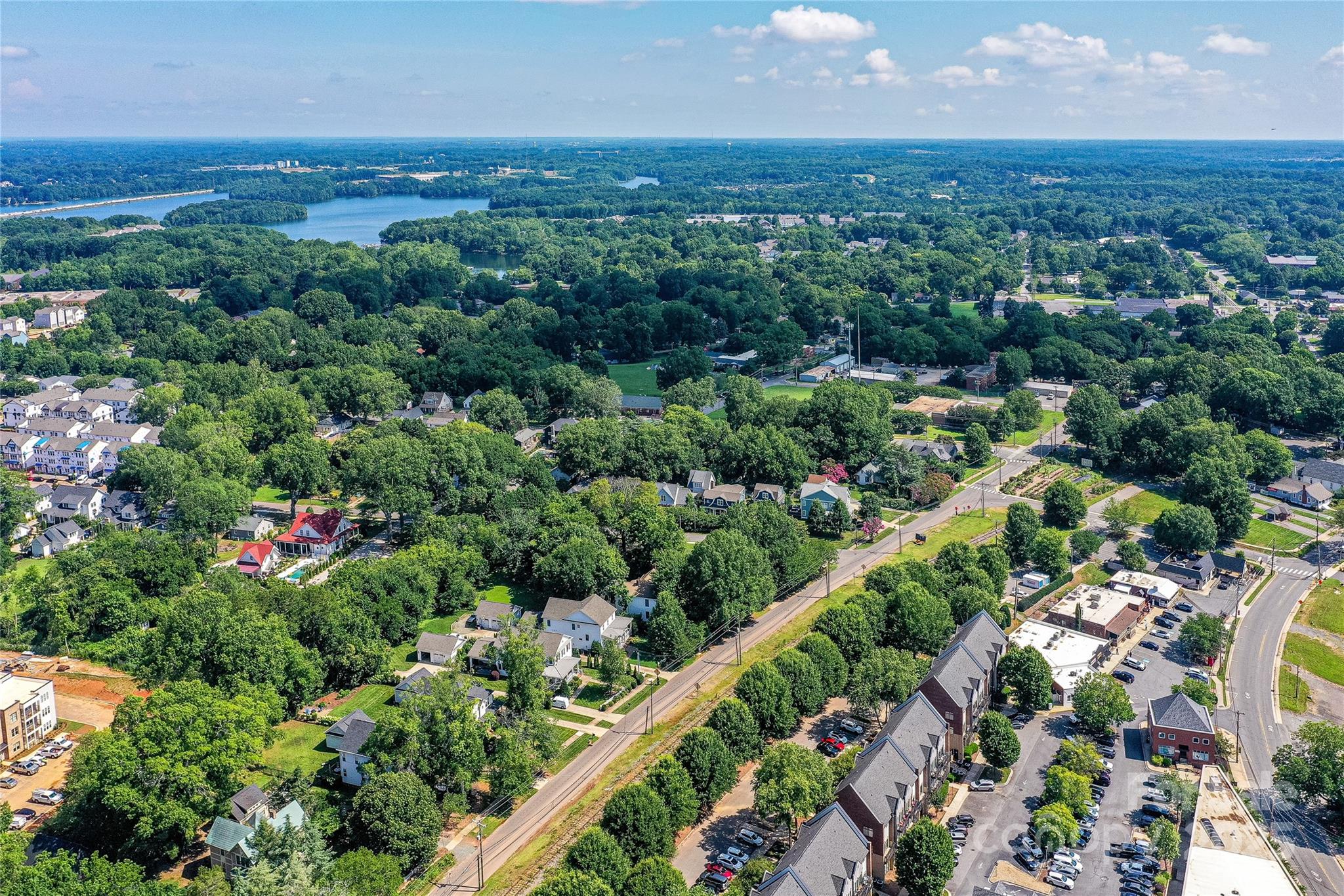 504 Potts Street Davidson, NC 28036 - Photo 19 of 34 an aerial view of a city with lots of residential buildings