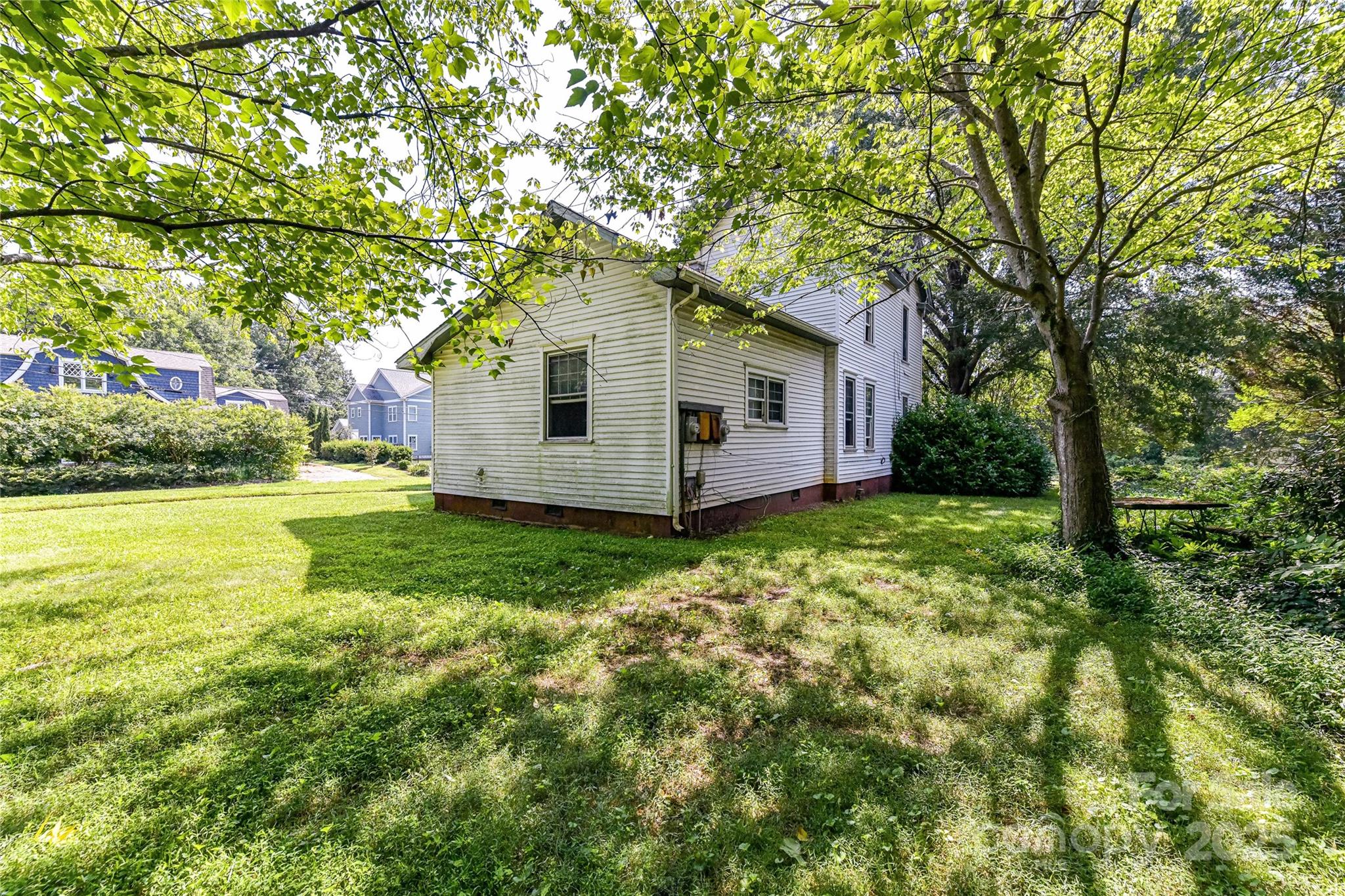 504 Potts Street Davidson, NC 28036 - Photo 2 of 34 a view of a house with a backyard