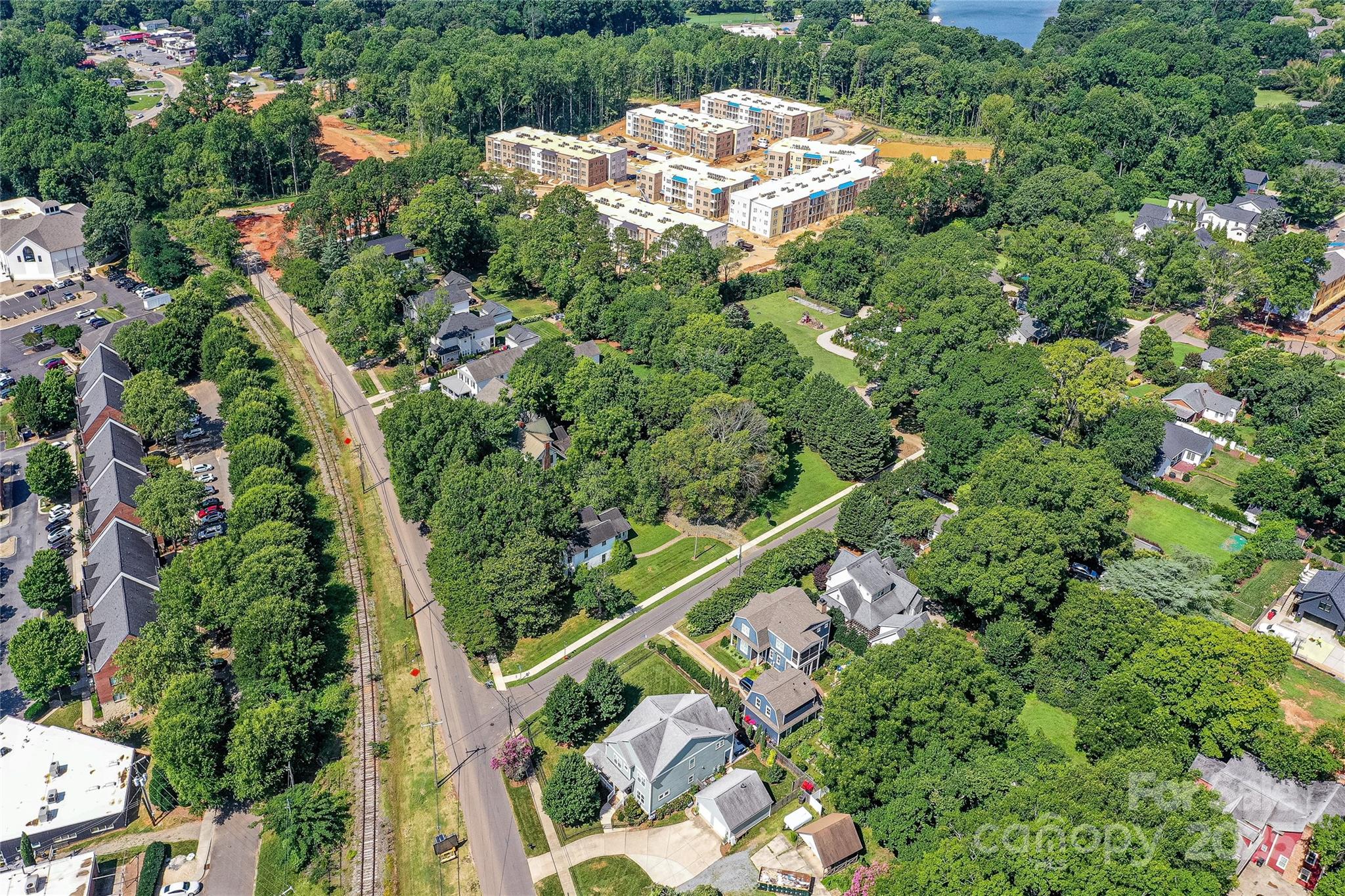 504 Potts Street Davidson, NC 28036 - Photo 27 of 34 an aerial view of a residential houses with yard and green space