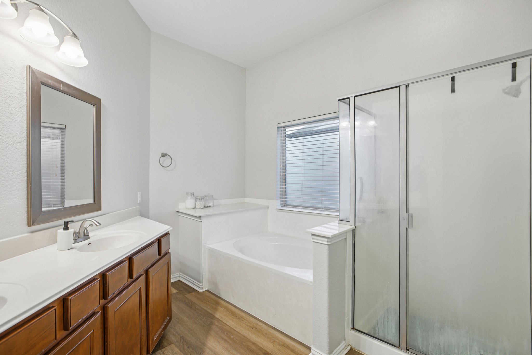 2308 Wind Vane West Pflugerville, TX 78660 - Photo 11 of 28 a bathroom with a granite countertop sink toilet and shower