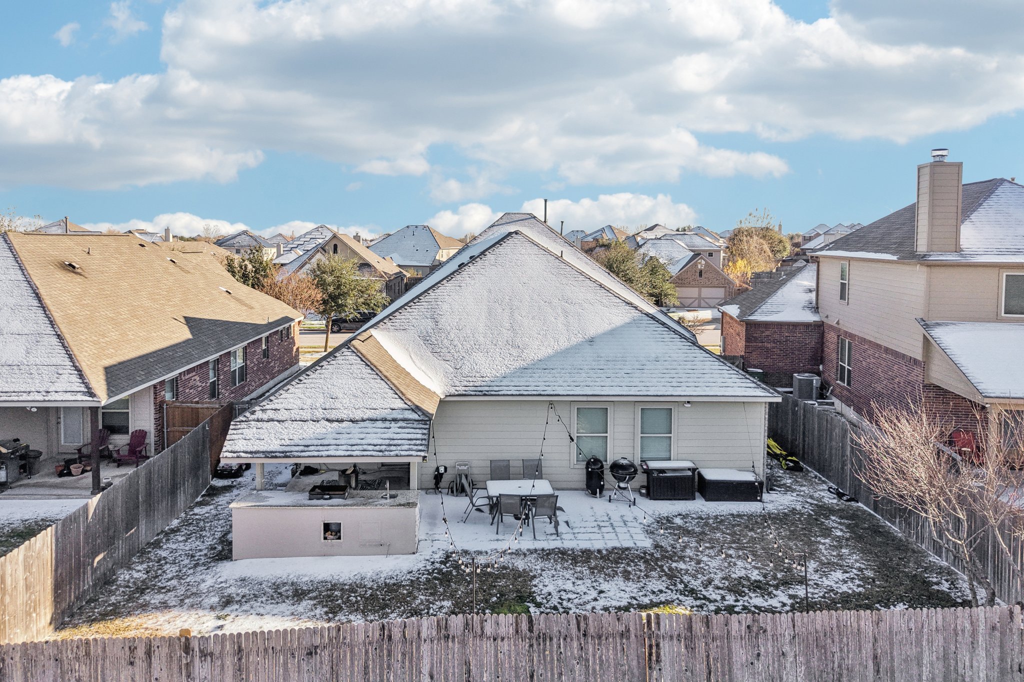 2308 Wind Vane West Pflugerville, TX 78660 - Photo 20 of 28 a view of a house with wooden deck and furniture
