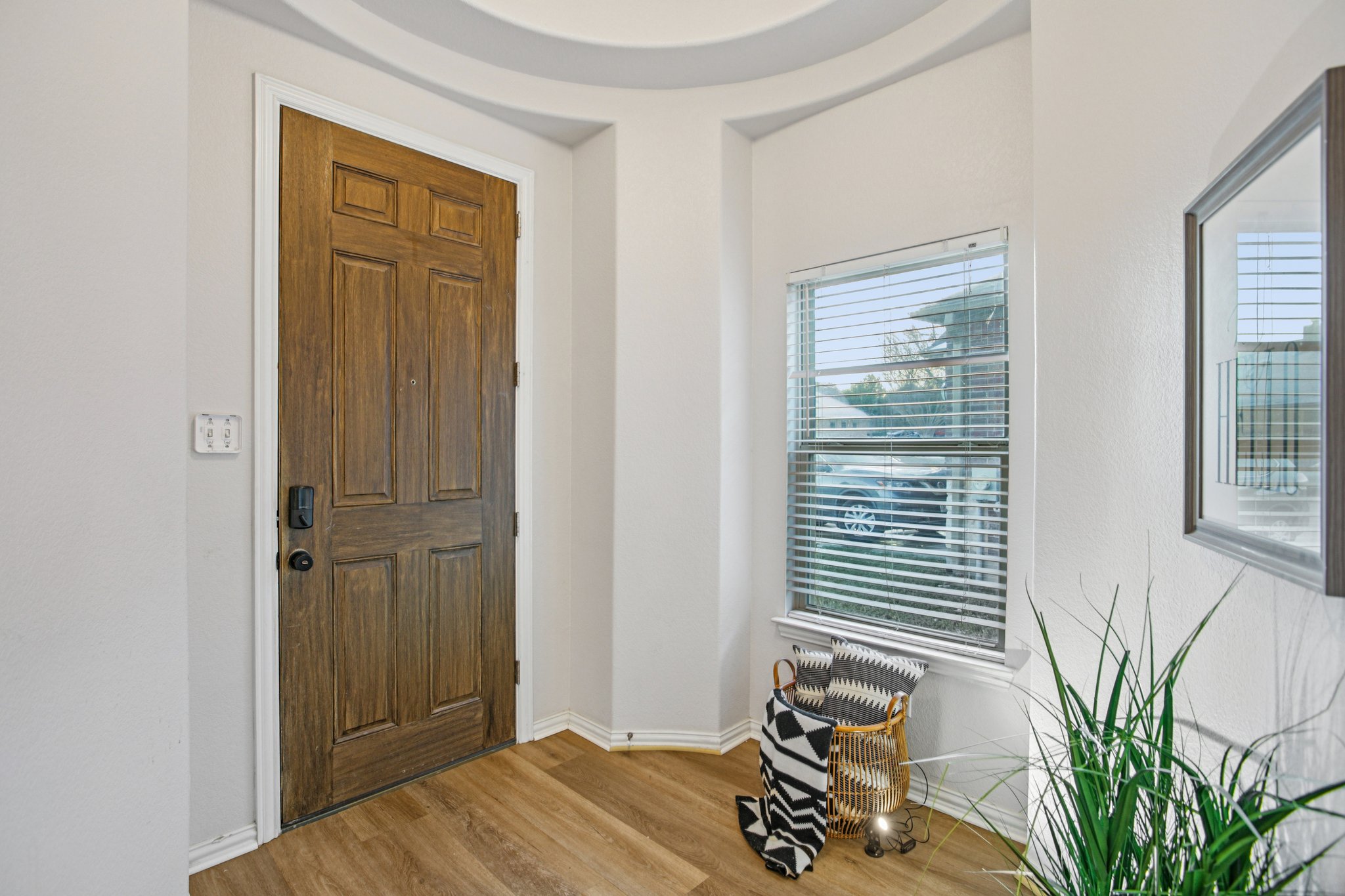 2308 Wind Vane West Pflugerville, TX 78660 - Photo 8 of 28 a bedroom with a bed and a window