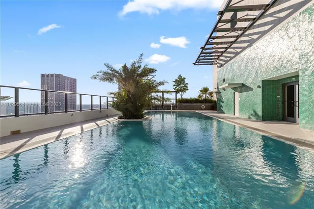 a view of a house with swimming pool