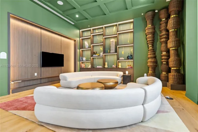 a living room with a couch and a flat screen tv