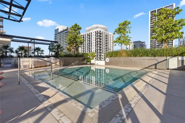 a view of a balcony with dining area