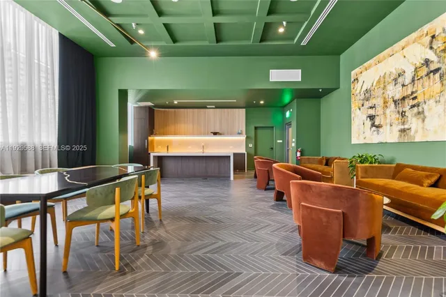 a room with furniture and a large window