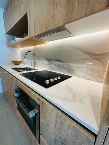 a close view of sink and microwave