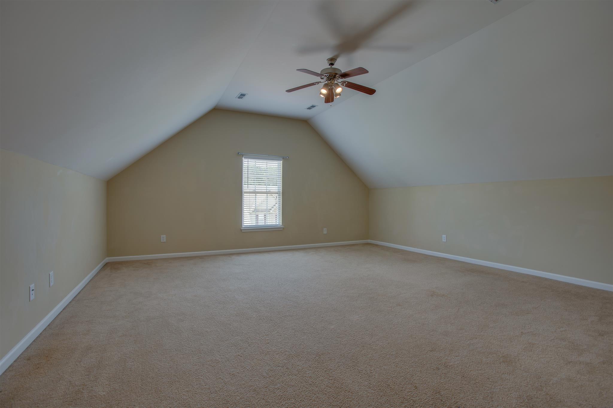 7039 Nickalus Way Spring Hill, TN 37174 - Photo 17 of 21 a view of a window in an empty room