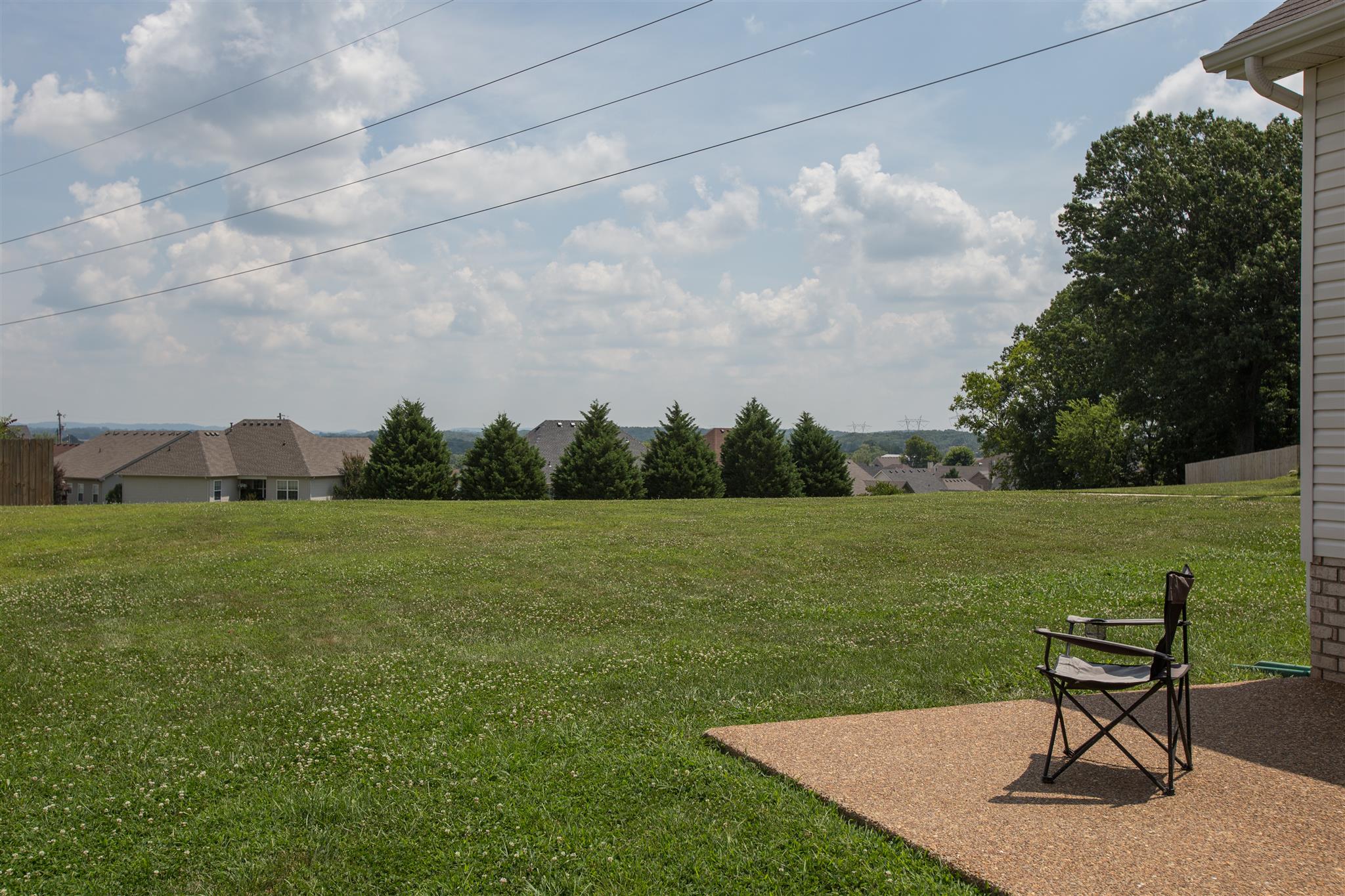 7039 Nickalus Way Spring Hill, TN 37174 - Photo 19 of 21 a view of a lake with a yard in back