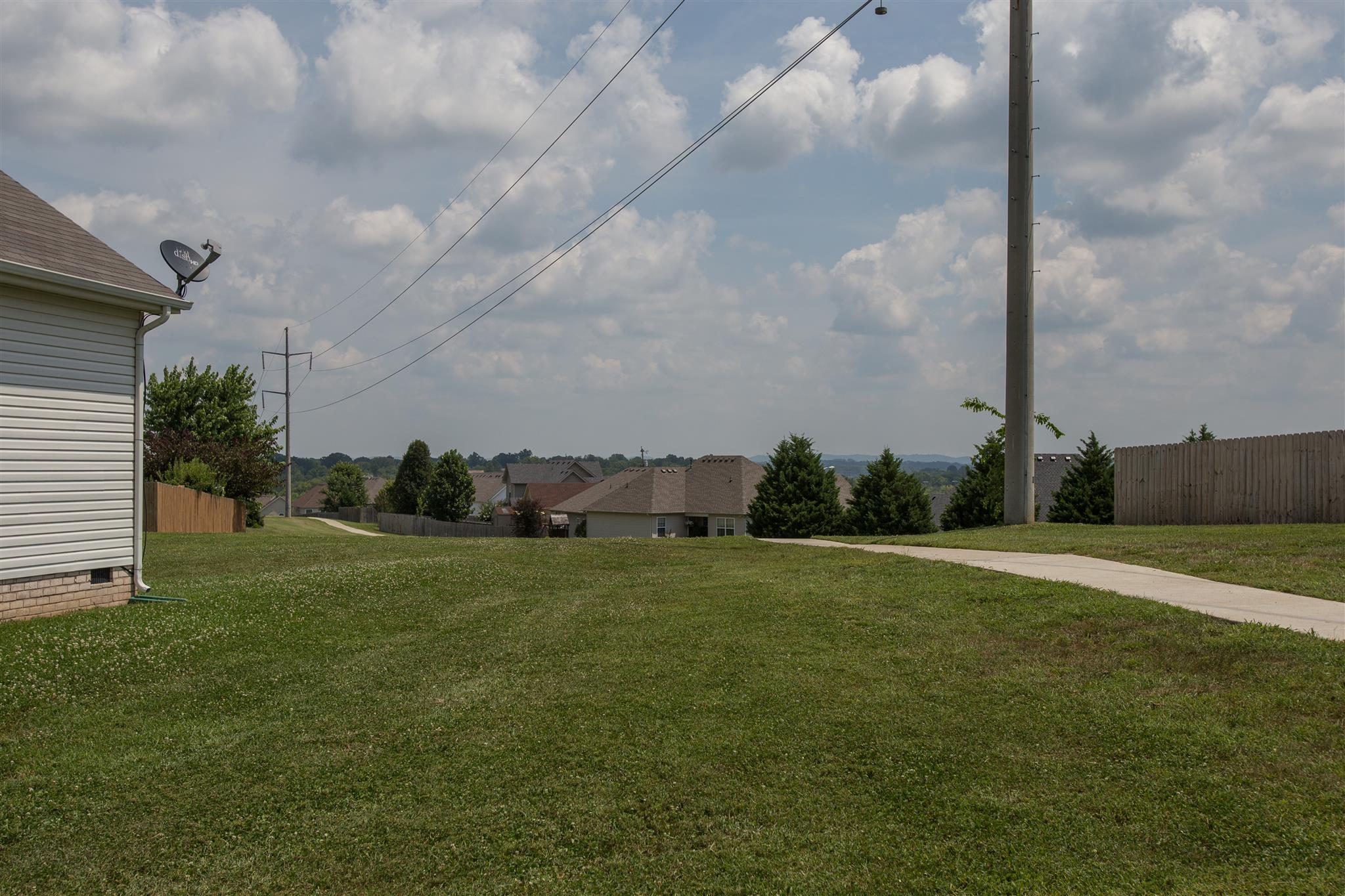 7039 Nickalus Way Spring Hill, TN 37174 - Photo 20 of 21 a view of a field with a big yard